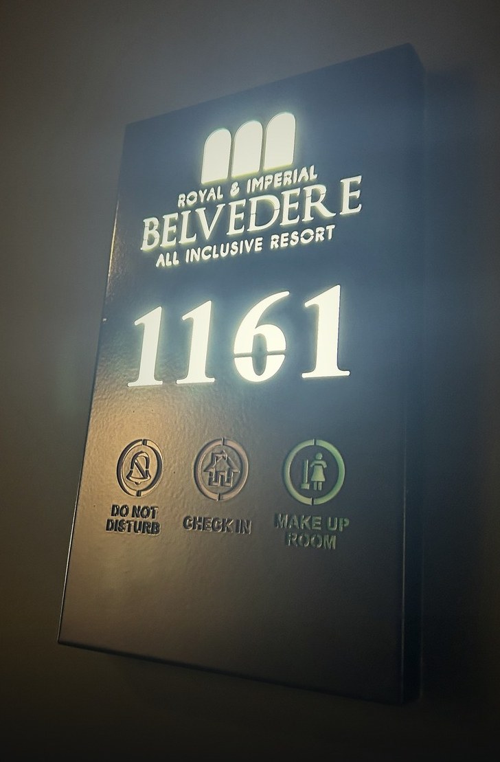 Illuminated sign of room 1161 showing Do Not Disturb, Check in and Make up room